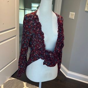 Size S gorgeous plunging blouse.